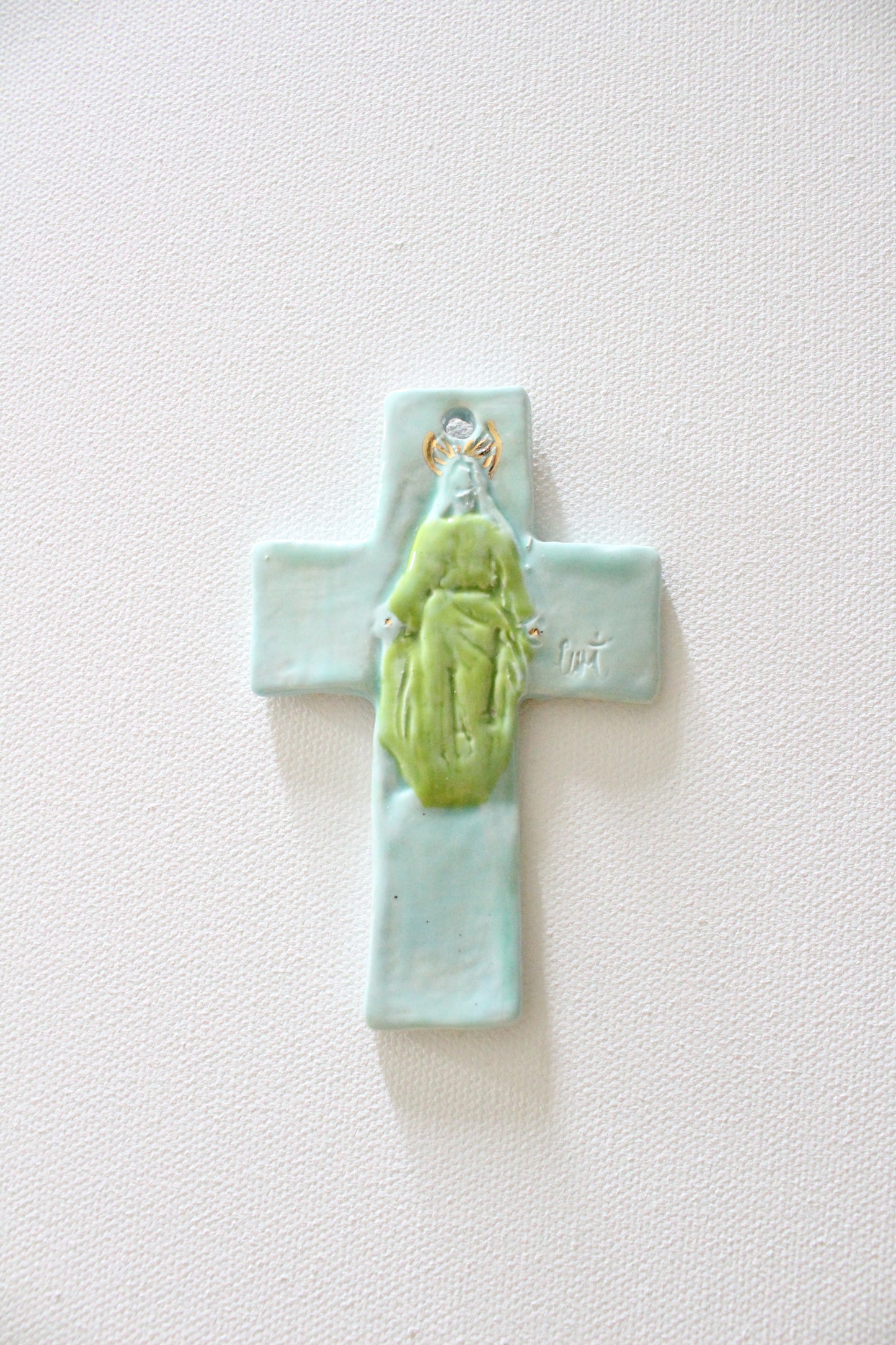 Blue and Green Jesus Hanging Cross